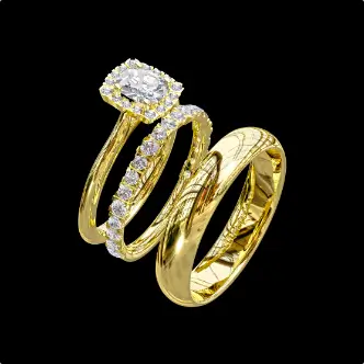 Bespoke engagement ring with matching wedding ring and gentleman’s wedding ring