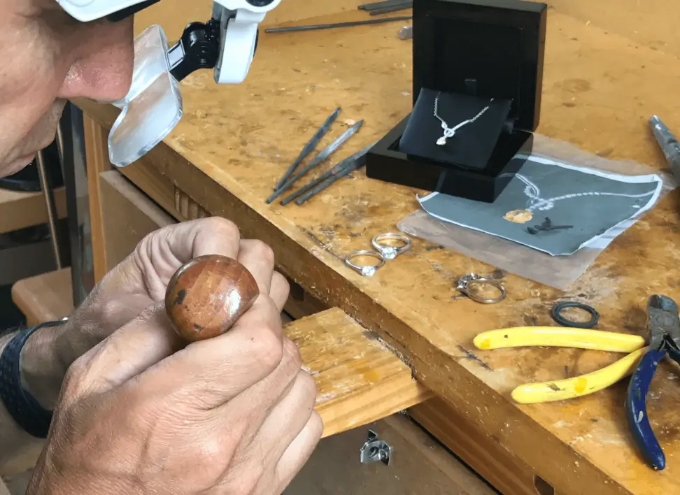 David Law crafting a bespoke pendant at the jewellers bench