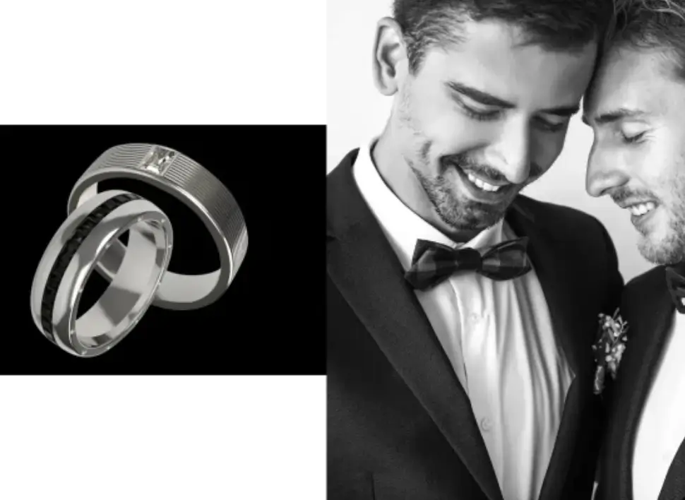 Two grooms on their wedding day, proudly showcasing their bespoke diamond-set wedding rings, symbolising their love and commitment.