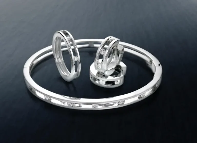 Fiamond bangle matching earring and rings designe in Ware Hertfordshire