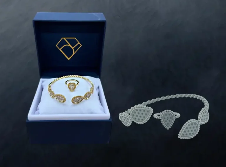 jewellery design Diamond bangle and ring presented in a luxury box alongside their 3D wax models — showing the transformation from wax concept to finished bespoke jewellery by David Law.