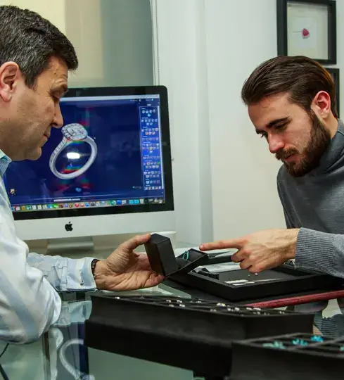 Jewellery Designer David Law working one two one with a client