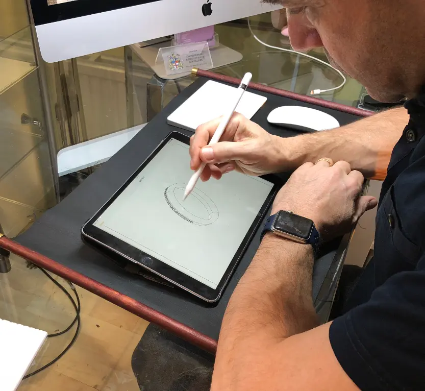 master jeweller David Law designing jewellery on an ipad