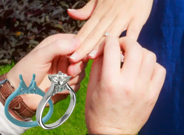 client putting a temporary enegent ring on the finger and showcasing twor ring proposa;