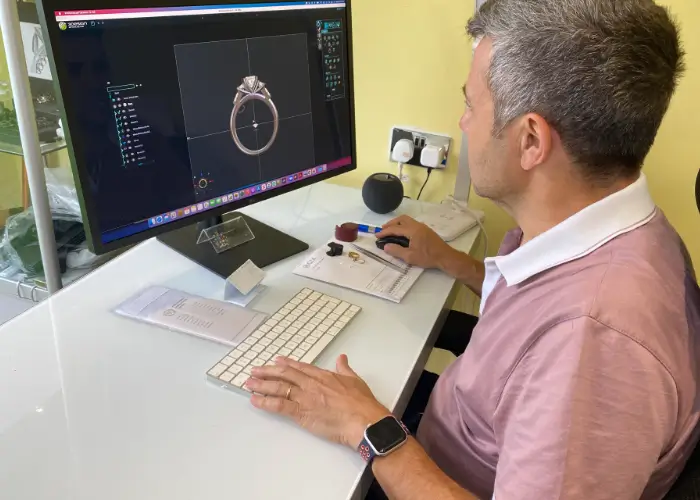 David Law designing a fine jewellery piece