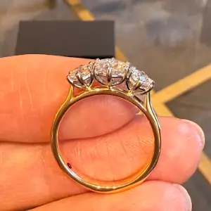 Two-stone diamond ring created from family jewellery, symbolising past and present