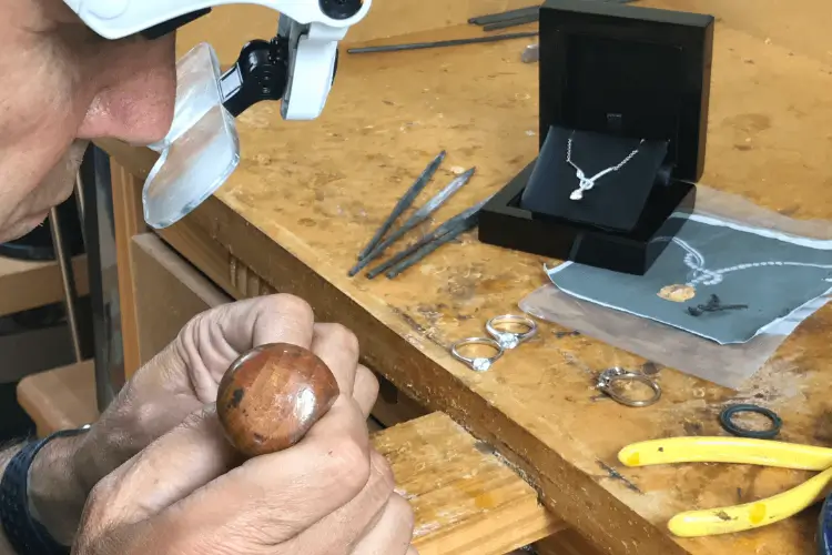 Jewellery designer David Law remodelling a jewellery piece