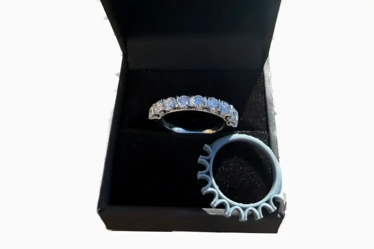 diamond band eternity ring with a wax model in a box