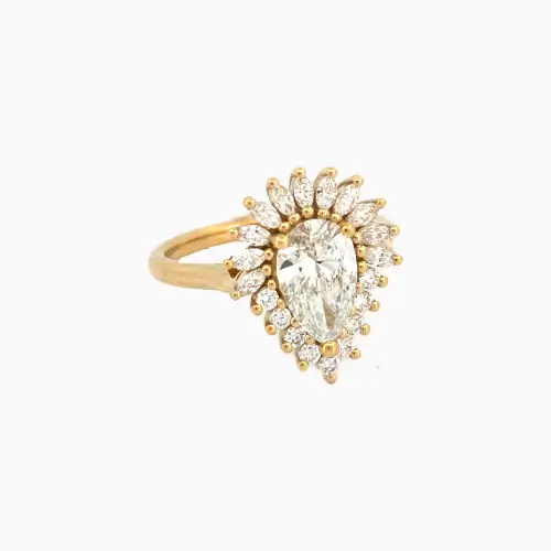 pear shaped diaond cluster bespoke engagement ring