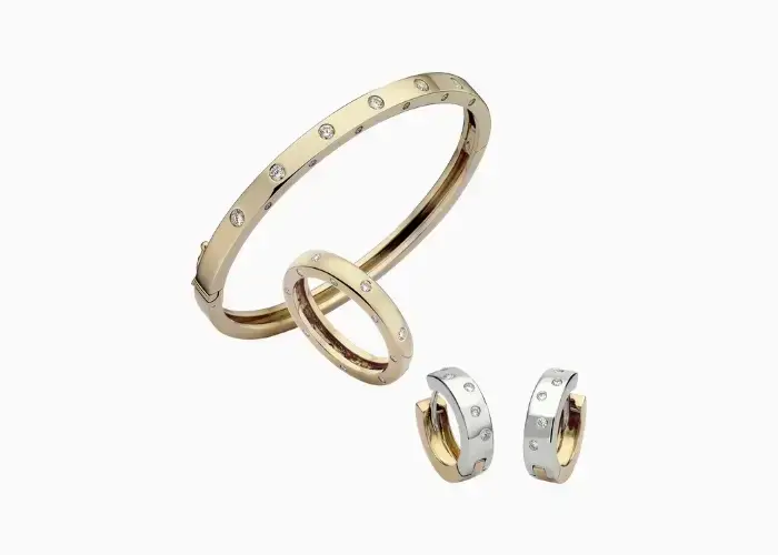 bespoke jewellery set comprising diamond bangle - ring and earrings